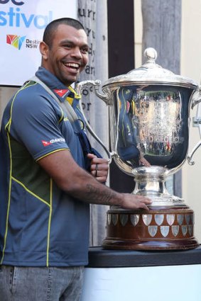 The prize: Kurtley Beale poses with the Bledisloe Cup.