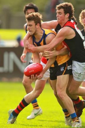 Essendon's Joe Daniher gets into the thick of things against Sandringham in round 16.