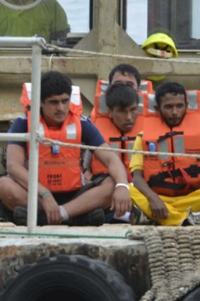 A group of asylum seekers arrive on Christmas Island.