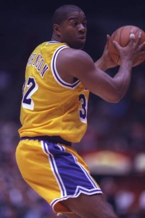 Magic man: Earvin Johnson playing for the LA Lakers in 1996.