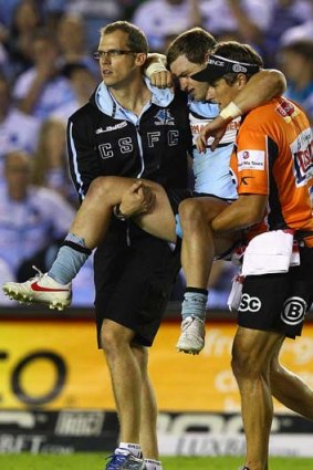 "Touch wood, he'll have this LARS surgery and hopefully he'll be back before the end of the season" ... Sharks coach Shane Flanagan.