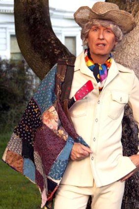 Straight shooter: The enigmatic Bob Downe strikes a pose at home.