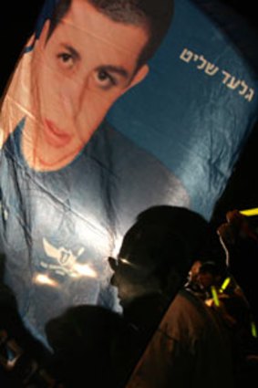 Free him...Israelis at a vigil for Shalit last March.