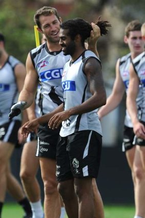 Training day: Travis Cloke (left) thinks it might be time for Harry O'Brien to get a haircut.
