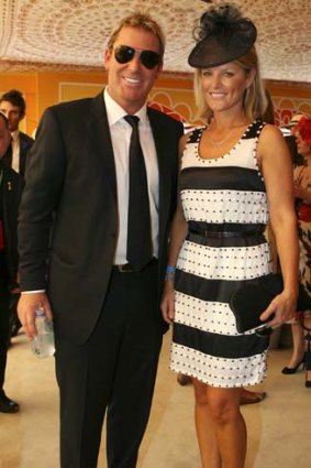 Pearly whites ... Simone and Shane Warne.