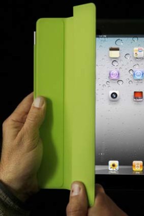 The Apple iPad 2 with a smart cover.