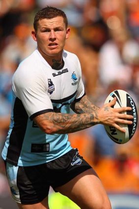 On the move ... Sharks coach Shane Flanagan hopes Todd Carney can rediscover his running game at five-eighth.