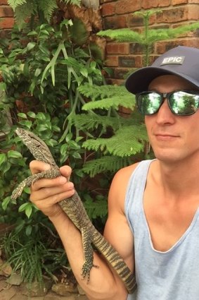 Chris Lindbeck, caught and saved this Rosenberg's monitor from being hit by a car on Severne Street, Greenleigh Estate on Tuesday. The Ellerton Drive Extension will destroy termite mounds used by the lizard to lay its eggs.