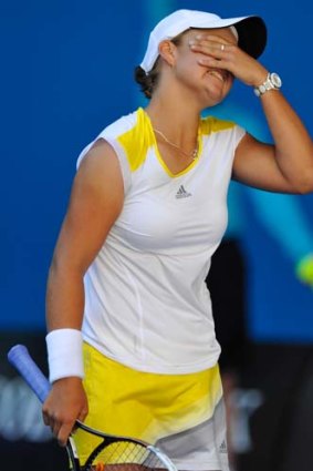 It's gone: Ashleigh Barty shows her frustration.