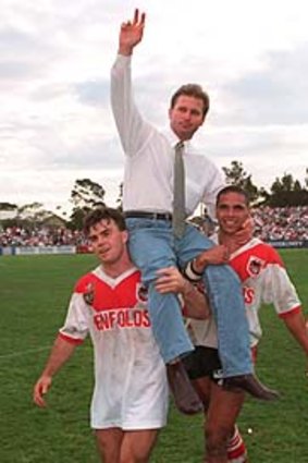 The end ... Brian Smith farewells the crowd after his last game in charge of St George in 1995.