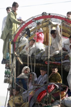 Pakistani children fleeing military operations arrive at a United Nations refugee camp north-west of Islamabad.
