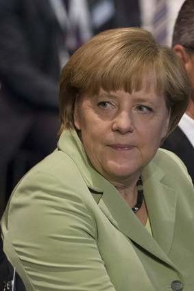 Under pressure: German Chancellor Angela Merkel.