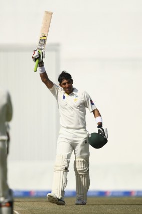 Filling their boots: Misbah-ul Haq equalled the fastest Test century in history in Abu Dhabi.