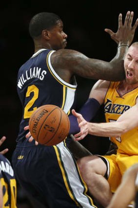 Los Angeles Lakers guard Steve Blake takes an elbow in the face from Utah Jazz's Marvin Williams last week. Blake was traded to Golden State.