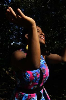 Yarrie Bangura recites some of her poetry at her home in Sydney.