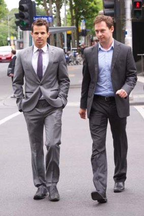 Legal protection: <i>Age</i> journalists Richard Baker and Nick McKenzie outside the court.