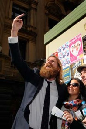 Comedian Sanderson Jones with Veronica Finarelli and Adam Houten, who bought tickets.