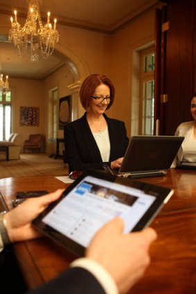 Prime Minister Julia Gillard responds to readers' questions on Facebook at Kirribilli House on Tuesday.