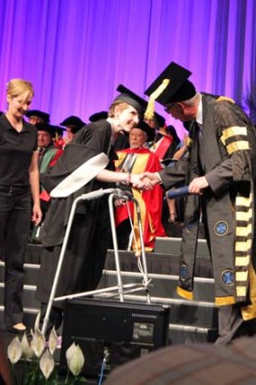 Bridget Harrington accepts her degree.