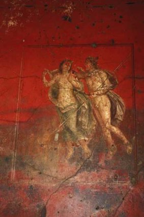 One of the original, and very red, Pompeii frescoes.