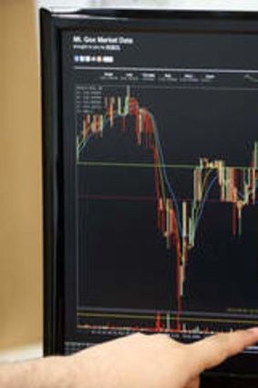 A  monitor displays the MtGox bitcoin exchange website on April 25, 2013.