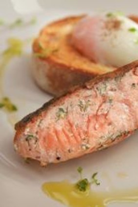 Salmon with eggs on toast.