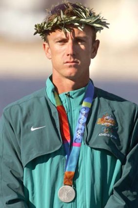 Nathan Baggaley pictured with a silver medal he won at the 2004 Olympic Games in Greece.
