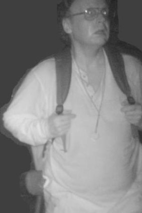 Caught: An image of  Knight from a 2012 surveillance photo.