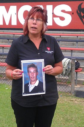 Sue Buckman with a photo of her son Stephen who died after he had a heart attack during training. Photo: Pamela Mirghani