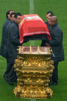 Eusebio's coffin is placed on the pitch of the Luz Stadium in Lisbon on Monday, before taken to the cemetery.