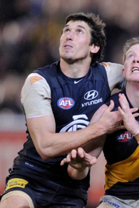 Richmond's Jack Riewoldt battles with Carlton's Michael Jamison during the round 18 clash at the MCG.