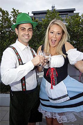 Ryan Klingberg and Emmy Haggkvist get a headstart on Oktoberfest celebrations at Limes Hotel.