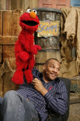 Elmo and Kevin Clash in Being Elmo.