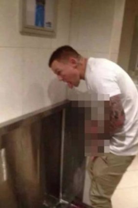 The infamous image that caused a social media storm. Todd Carney was snapped at a urinal creating a 'fountain'.