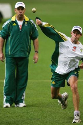 Fielding guru: Mike Hussey of Australia in action as fielding coach Mike Young looks on.