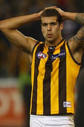 Hawthorn's Lance Franklin is dejected after his side's loss to Geelong.