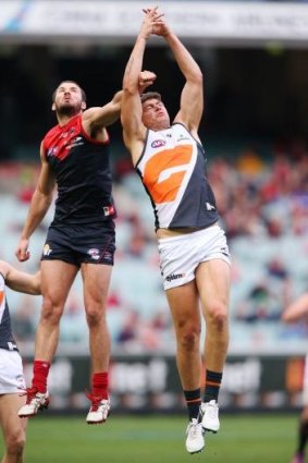 New deal: Jonathon Patton suffered a right leg injury after landing awkwardly from this contest against Melbourne.