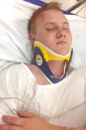 Latest victim: Alexander McEwen lies in hospital with a fractured skull.