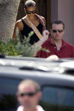 Michelle Obama leaves the Spanish resort. <i>Picture: AFP</i>