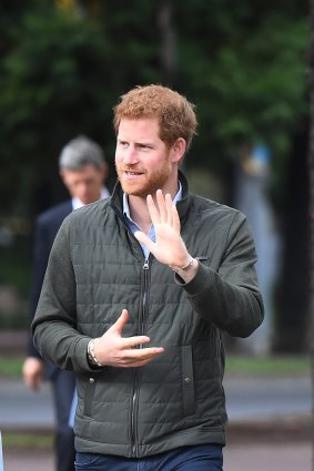 Prince Harry sports a puffer jacket in Sydney on his recent tour of Australia.
