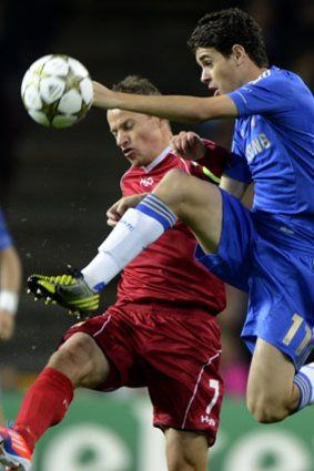 Chelsea's Oscar (right) and Nicolai Stokholm from FC Nordsjalland vie for the ball in their Champions League match in Copenhagen.