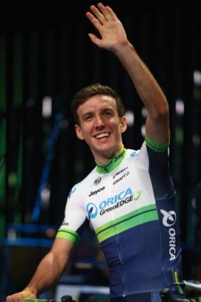 Simon Yates waves to the crowd during the Tour de France team presentation in Leeds on Friday.