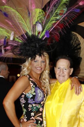 Peacock and canary ... Brynne and Geoffrey Edelsten.