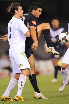 Sail away ... former Mariner Nik Mrdja, right, turns out in Melbourne colours on Friday night.