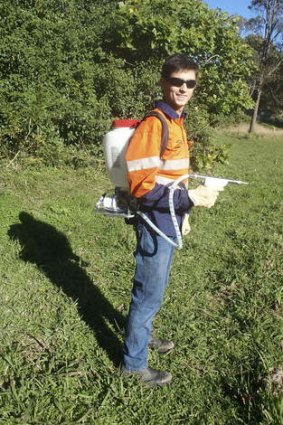 Demonstrated creativity: Joshua Mason of Wyong Christian Community School shows off his design for an industrial noxious weed sprayer.