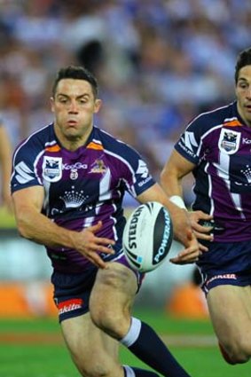 Action man: Storm's Cooper Cronk heads for the line yesterday.