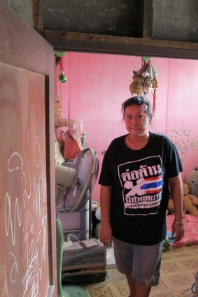 Former prostitute Lek in her home in Klong Toey slum.