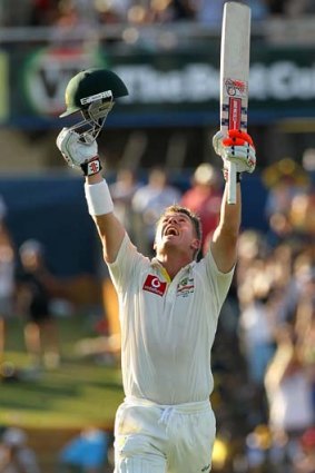 Heavens above ... a jubilant David Warner after he completed his superb century against India.