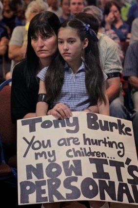 Signs of frustration: locals send a message to Water Minister Tony Burke.