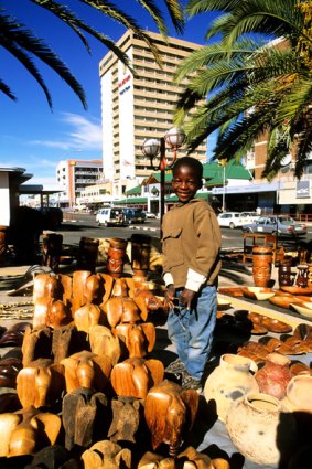 Sea to sand ... a young souvenir salesman in Windhoek.
